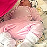 baby, blanket, child, cozy, cute, hat, hello_kitty, indoor, infant, newborn, person, pink_clothing, portrait, relaxation, rest, sleeping, socks, soft_fabric, soft_lighting, winnie_the_pooh