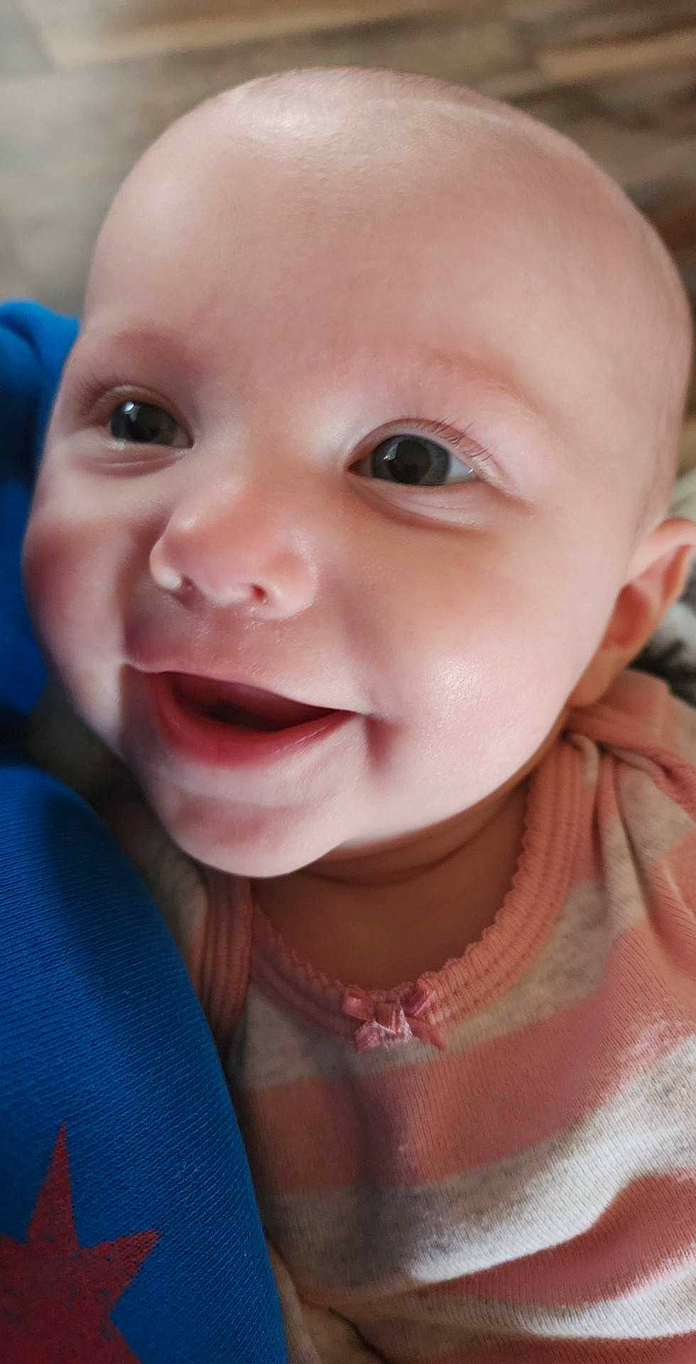 Lenora is registered to the contest to win money with this photo: baby, baby_toddler_clothing, blond, cheek, child, eye, eyebrow, eyelash, happy, iris, lip, magenta, mouth, neck, nose, pink, skin, sleeve, smile, toddler