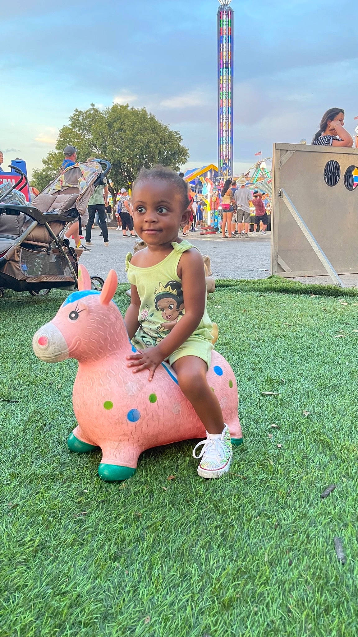 Nia joined the competition — help win amazing prizes! baby, child, city, event, fawn, fun, grass, happy, joy, lawn_ornament, leisure, livestock, person, playground, pole, recreation, sky, stuffed_toy, suidae, teddy_bear