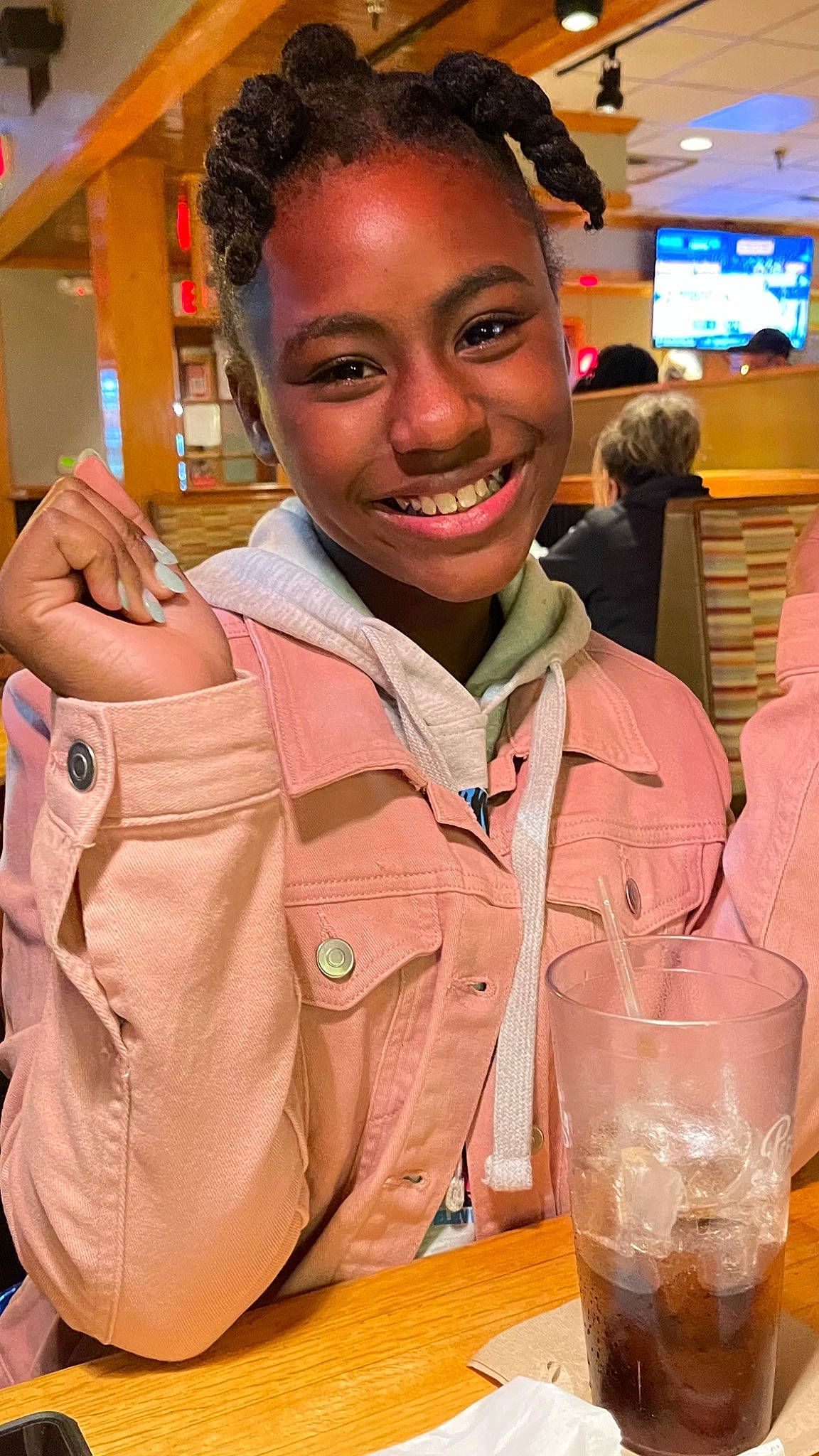 Geniya is registered to the contest to win money with this photo: barware, chair, child, customer, distilled_beverage, drink, drinking, drinkware, event, fun, glass, happy, jacket, joy, organ, person, service, skin, smile, soft_drink