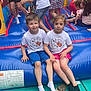 Jessy participe au concours pour gagner de l'argent avec cette photo : activity, bounce_house, boy, casual_clothing, children, colorful, friends, fun, girl, group, indoor_play_area, inflatable, kids, playground, playing, shoes, shorts, socks, summer, white_tshirt