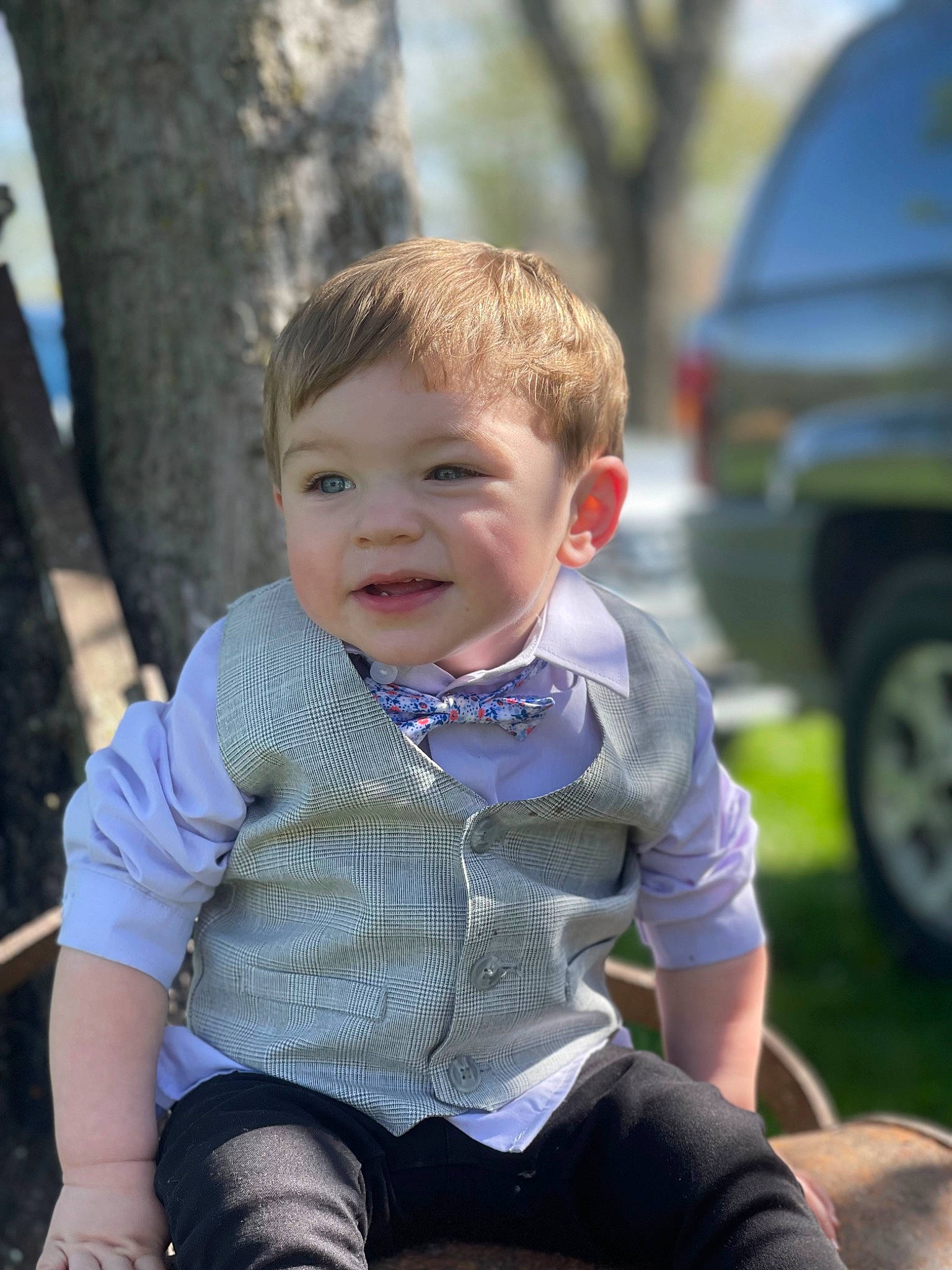 Colton joined the competition — help win amazing prizes! baby_toddler_clothing, electric_blue, eye, face, facial_expression, fun, grass, happy, head, leisure, people, person, recreation, skin, smile, standing, summer, tire, toddler, tree