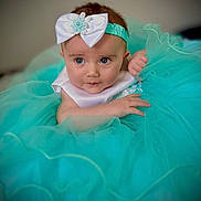 Skylar joined the competition — help win amazing prizes! baby, child, dress, headband, bow, blue, tulle, cute, portrait, infant, smiling, hands, face, eyes, fashion, indoor, soft_light, young, person, adorable