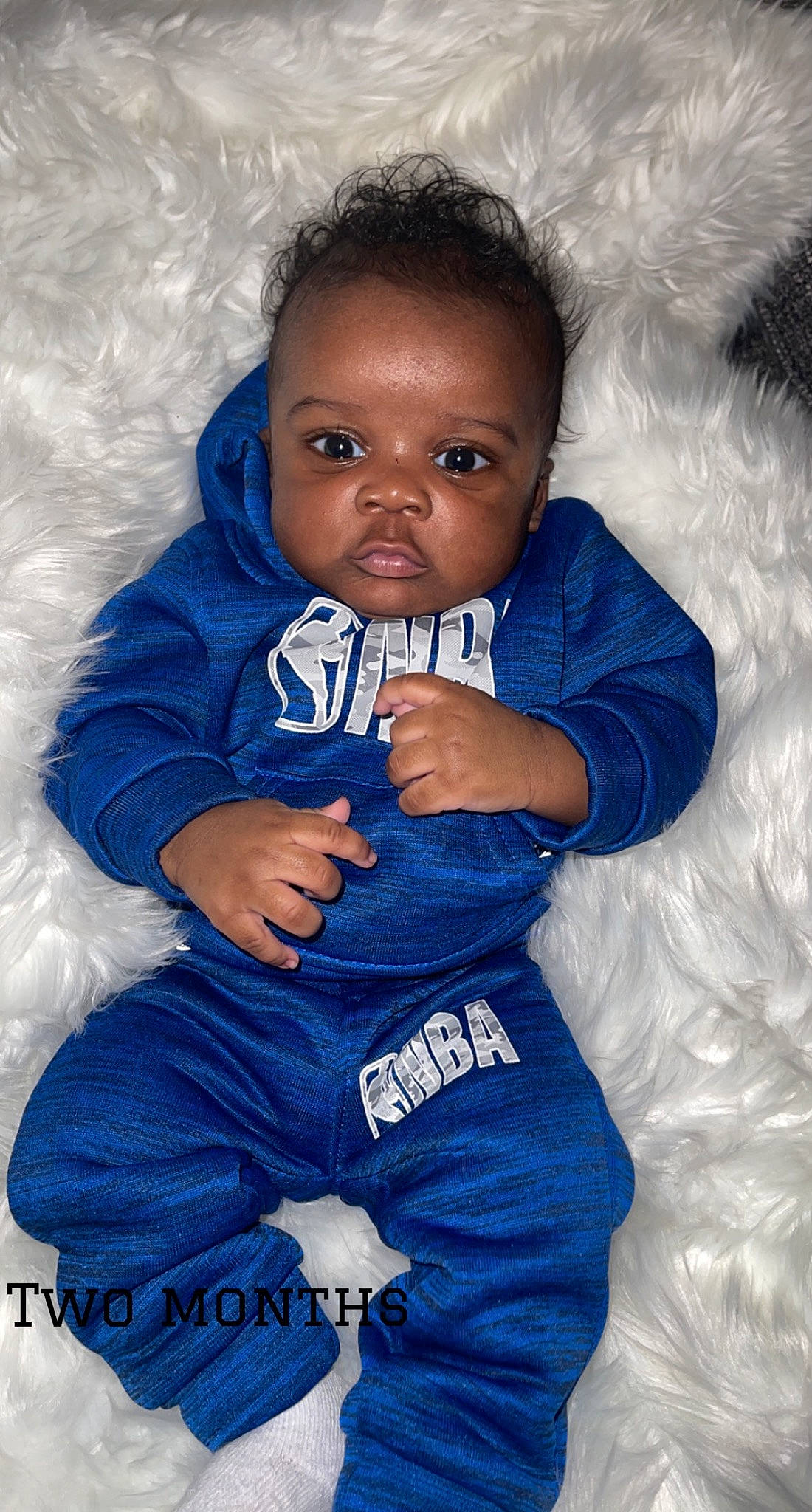 Dash is registered to the contest to win money with this photo: arm, baby_toddler_clothing, blue, cheek, eye, face, flash_photography, gesture, hair, hand, happy, head, human_body, iris, nose, person, pink, purple, skin, sleeve