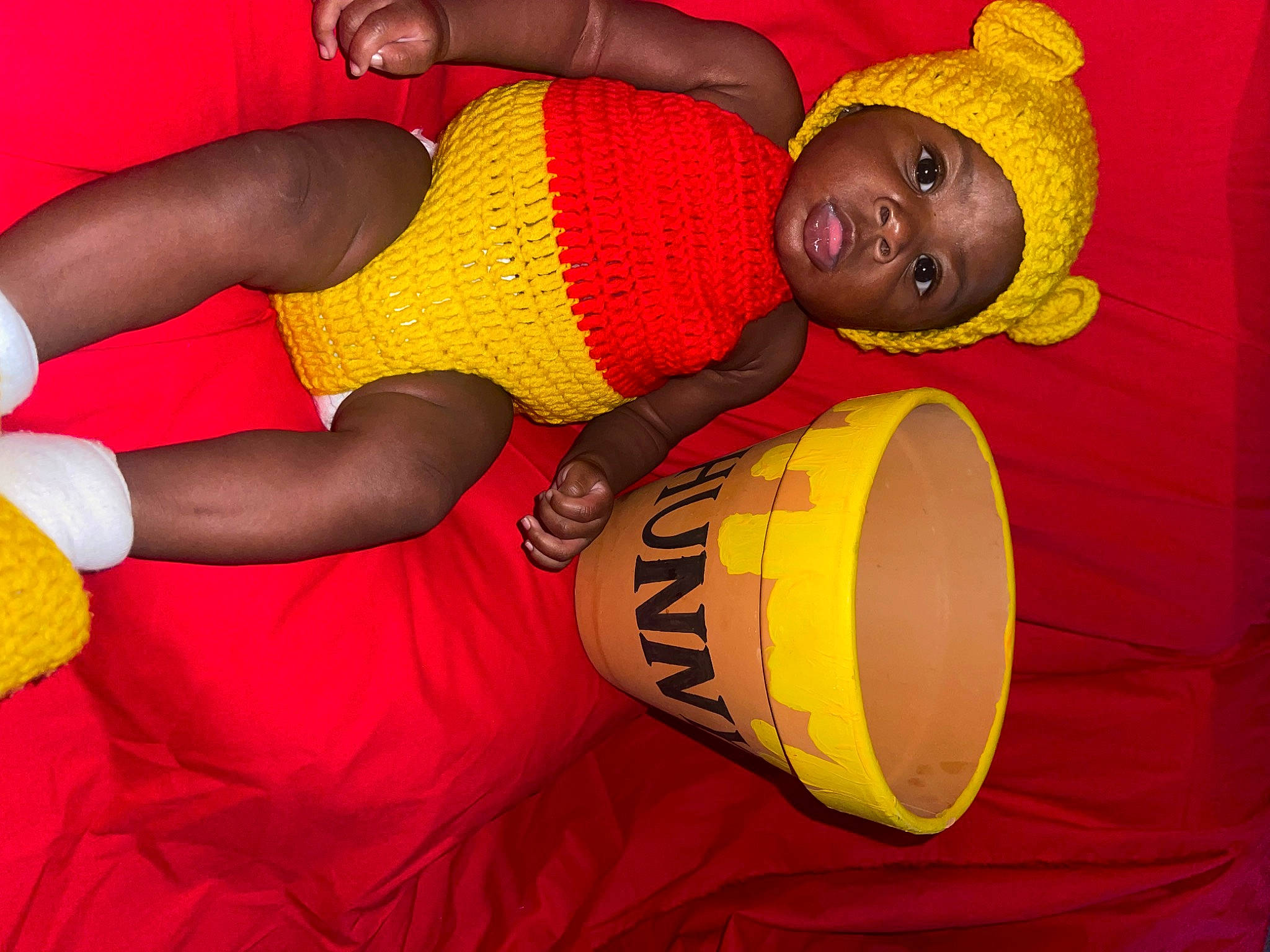 Dazlyn joined the competition — help win amazing prizes! abdomen, baby, baby_toddler_clothing, chest, child, comfort, elbow, fun, happy, hat, headwear, human_leg, knee, leisure, orange, pattern, person, sportswear, thigh, toddler