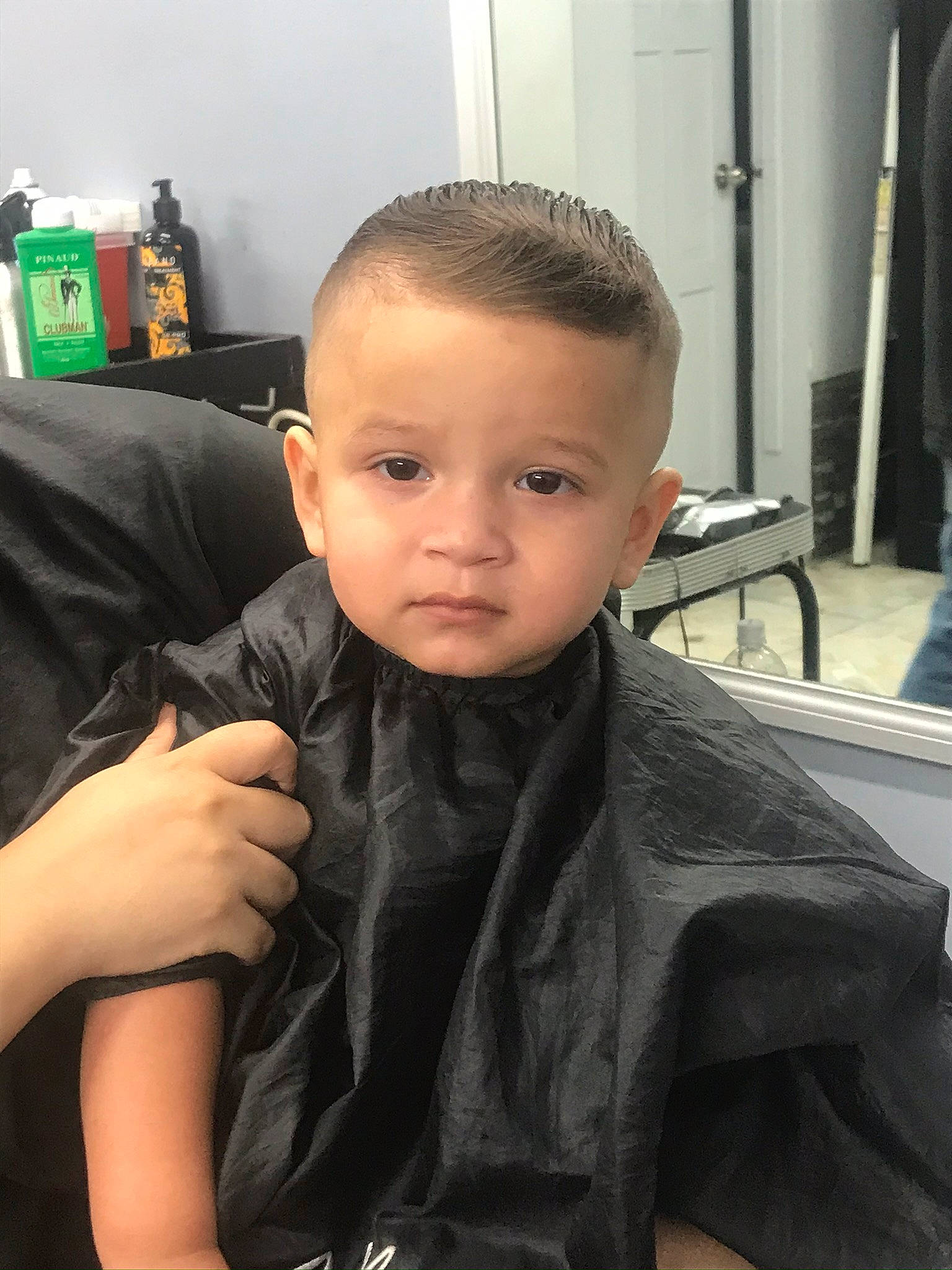 Aiden is registered to the contest to win money with this photo: black_hair, buzz_cut, child, eyebrow, face, forehead, hair, hairstyle, head, neck, person