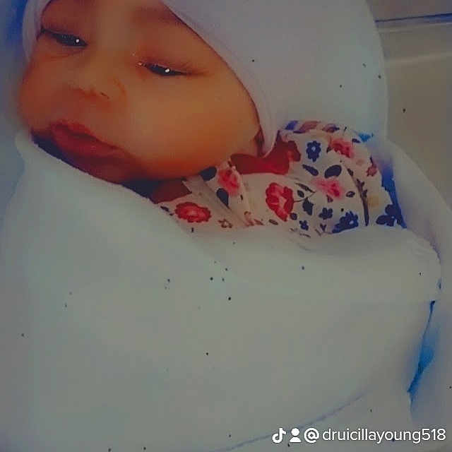 Ja'Zaiyah is registered to the contest to win money with this photo: baby, baby_products, bedding, cap, carmine, cheek, child, eyebrow, eyelash, linens, lip, nose, pattern, plastic, portrait_photography, room, skin, sleeve, toddler, winter