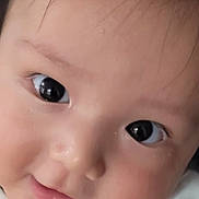 Isaac joined the competition — help win amazing prizes! baby, close_up, face, eyes, skin, cheeks, expression, curious, infant, person, portrait, cute, child, newborn, adorable, soft, gentle, hand, fingers, white_clothing