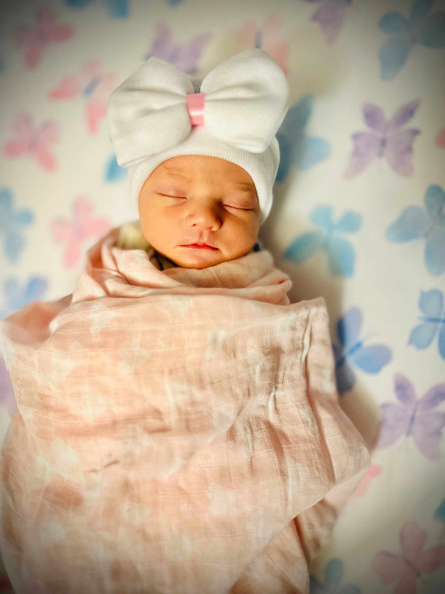 Reese is registered to the contest to win money with this photo: newborn, baby, sleeping, hat, bow, blanket, pink, white, soft, cozy, butterfly, pattern, infant, cute, portrait, sleep, child, toddler, wrapped, peaceful