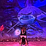 animal, art, canine, colorful, dog, graffiti, ground, leash, mural, night, outdoor, pink_lighting, portrait, purple_lighting, shark, sitting, street_art, urban, vibrant, wall