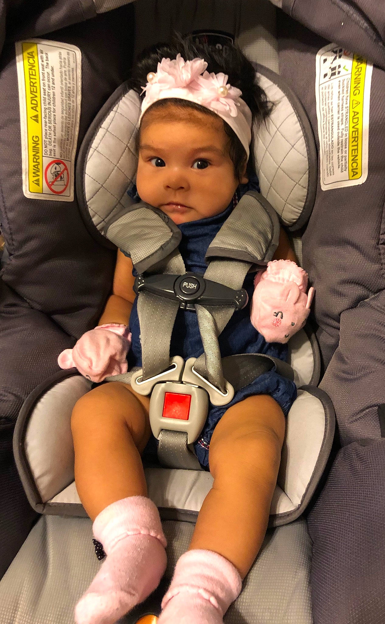 Selena joined the competition — help win amazing prizes! baby_carriage, baby_products, car_seat, child, finger, girl, hand, headgear, infant, lap, leg, person, product, sitting, skin, toddler