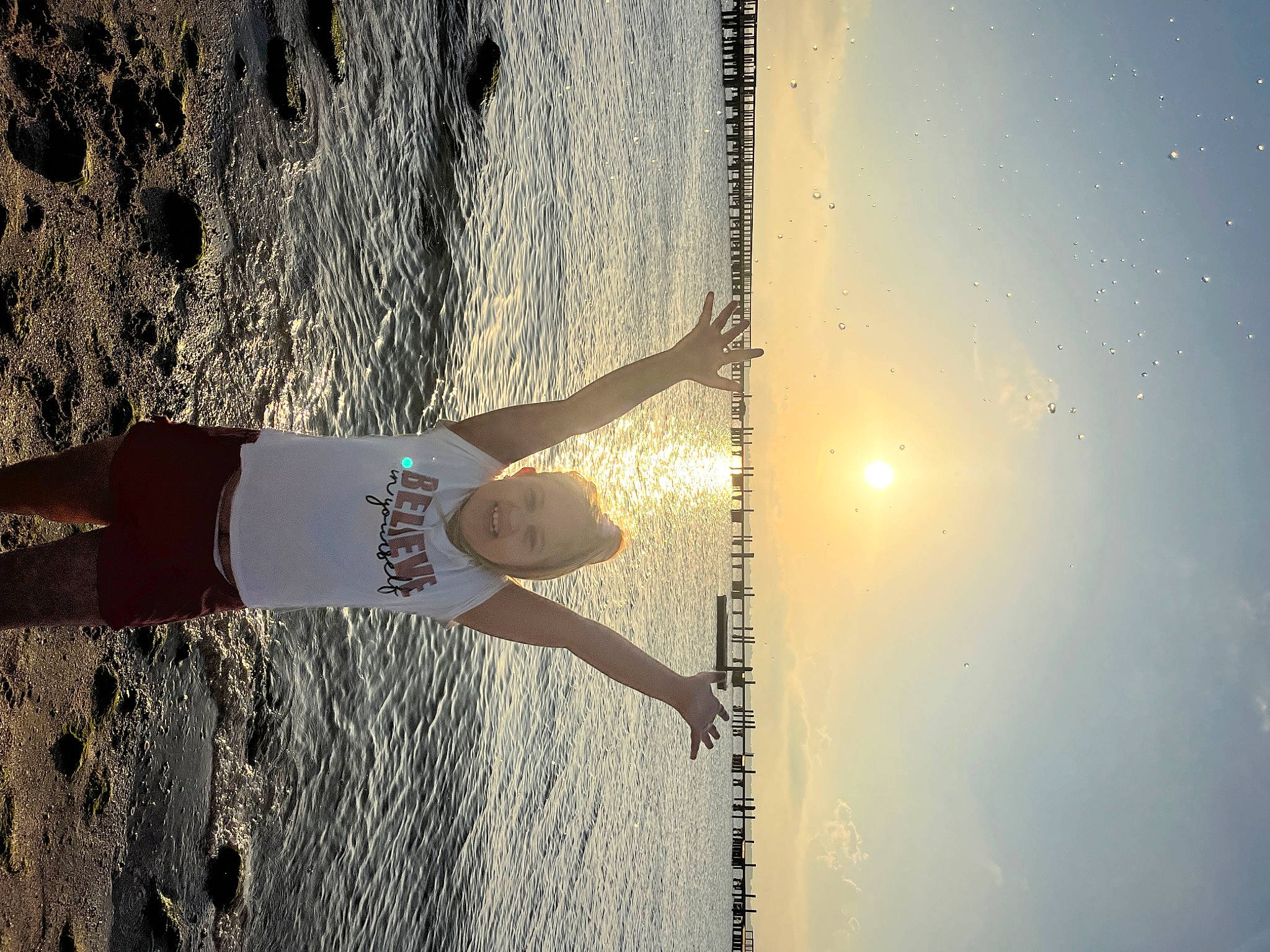 Mia-rose joined the competition — help win amazing prizes! azure, beach, calm, elbow, flash_photography, happy, horizon, human_body, human_leg, joy, lake, people_in_nature, person, reflection, sky, sunlight, thigh, tints_and_shades, tree, waist