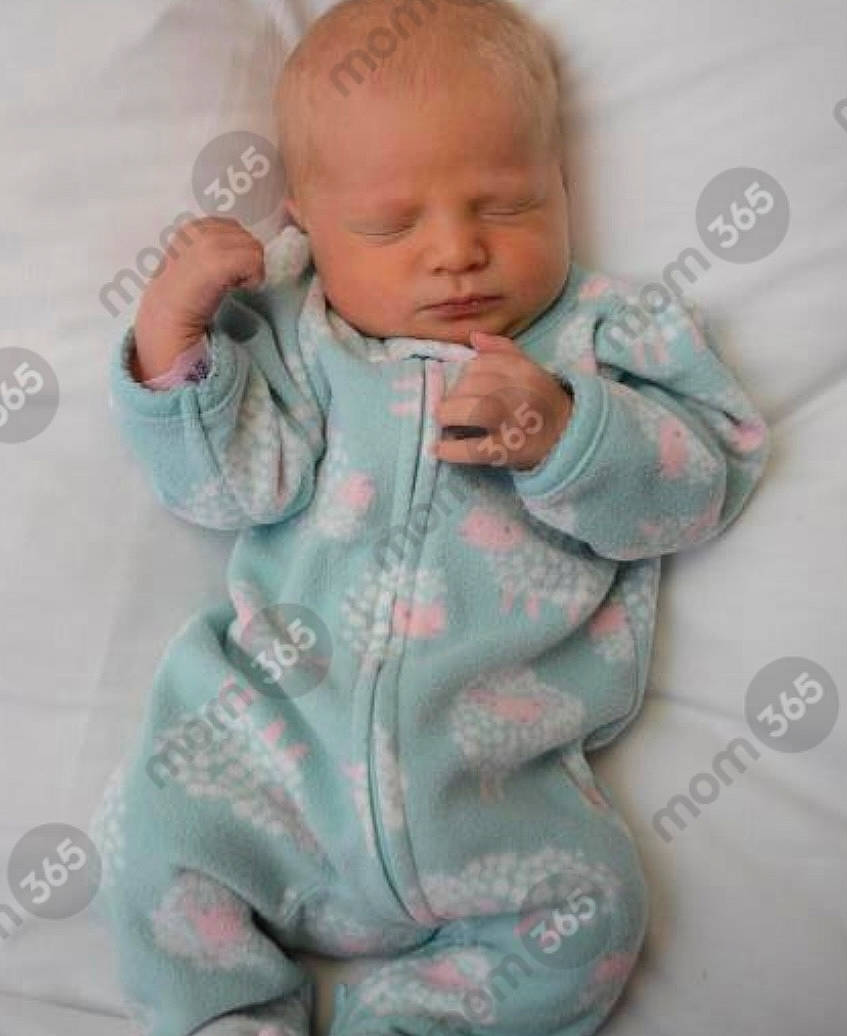 Gracelynn is registered to the contest to win money with this photo: arm, baby, baby_toddler_clothing, cheek, comfort, ear, eye, face, gesture, head, human_body, iris, lip, mouth, neck, nose, person, pink, skin, sleeve