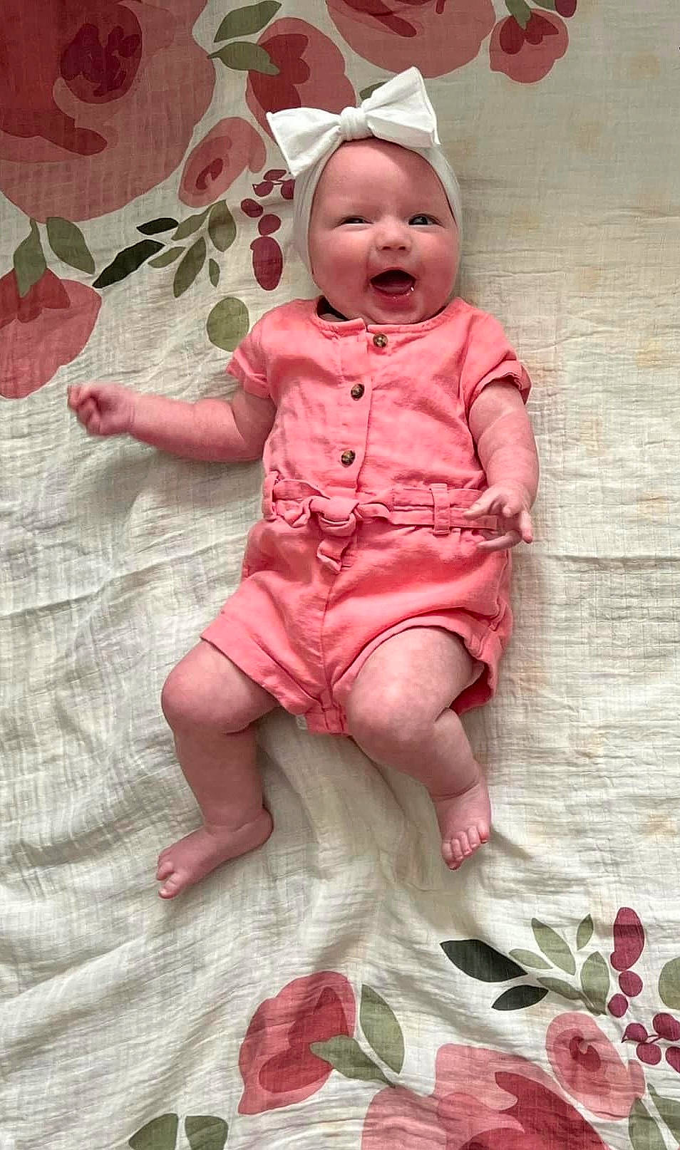 Jayde joined the competition — help win amazing prizes! baby, baby_toddler_clothing, carmine, cheek, child, dress, face, foot, happy, head, headwear, linens, pattern, peach, person, pink, red, skin, sleeve, smile