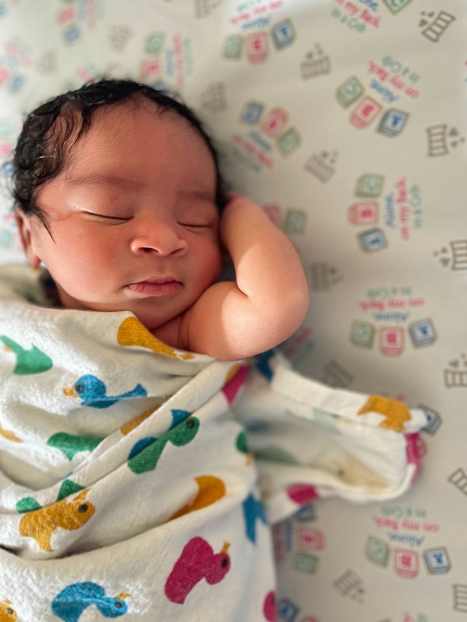 Devon joined the competition — help win amazing prizes! baby, baby_sleeping, baby_toddler_clothing, bed_sheet, bedding, bedtime, cheek, child, comfort, face, finger, happy, linens, nose, pattern, person, skin, sleeve, textile, toddler