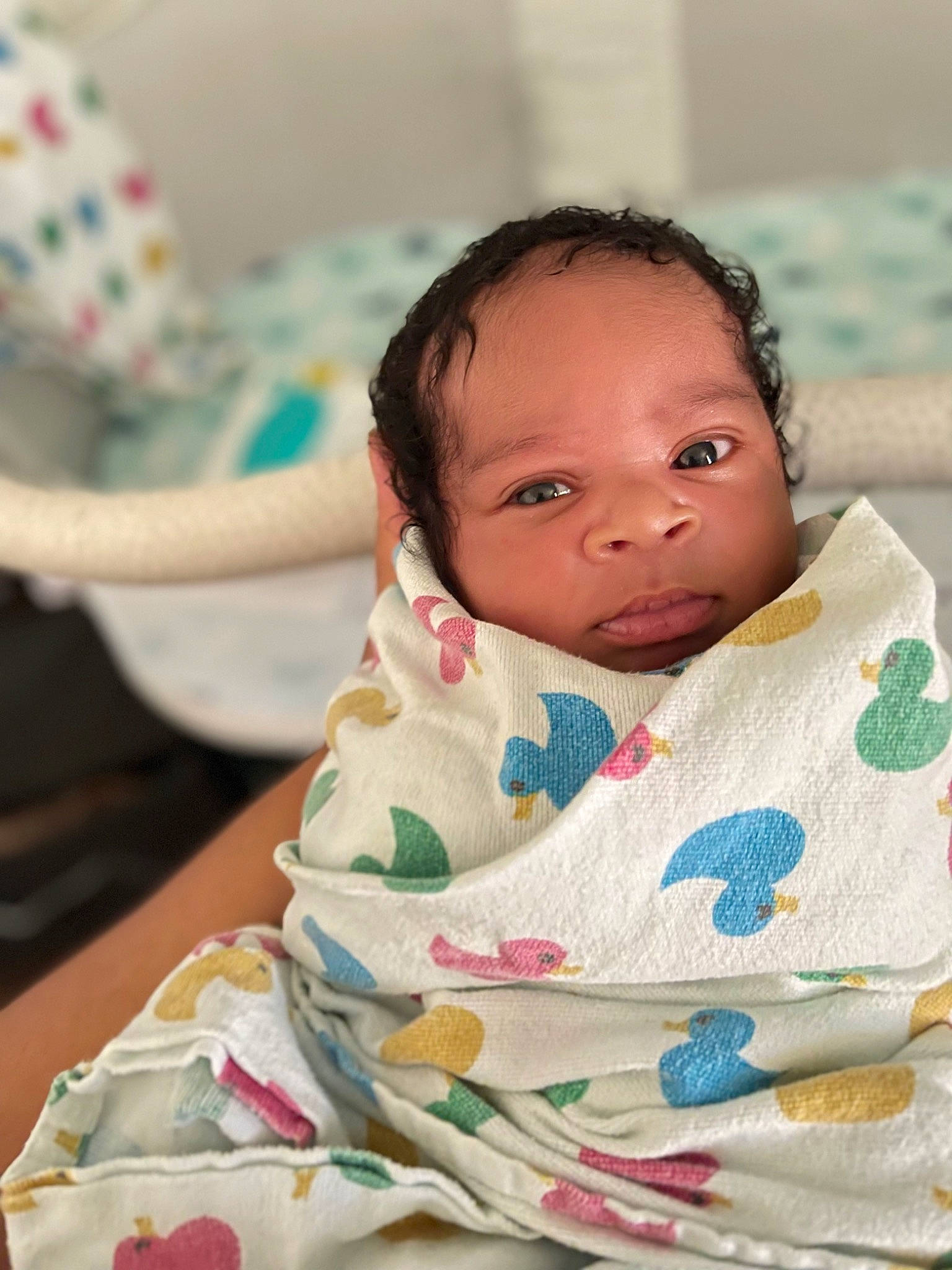 Devon is registered to the contest to win money with this photo: baby, baby_toddler_clothing, bib, cheek, child, comfort, dishware, event, eye, eyelash, face, happy, head, linens, neck, nose, person, skin, sleeve, toddler