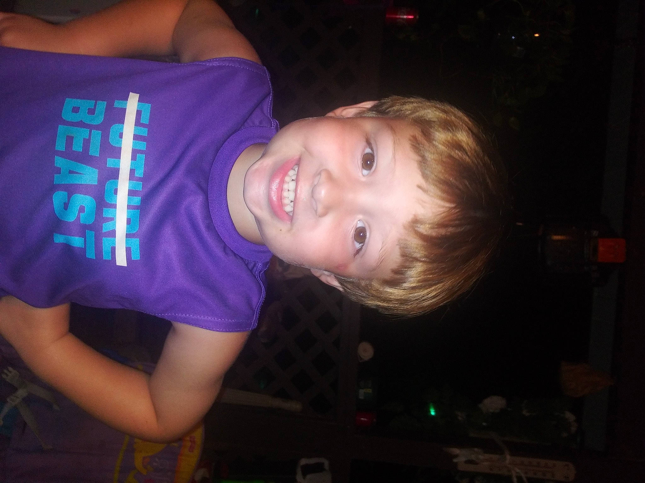 Trenton is registered to the contest to win money with this photo: arm, child, cool, ear, fun, joy, night, party, person, t_shirt, toddler