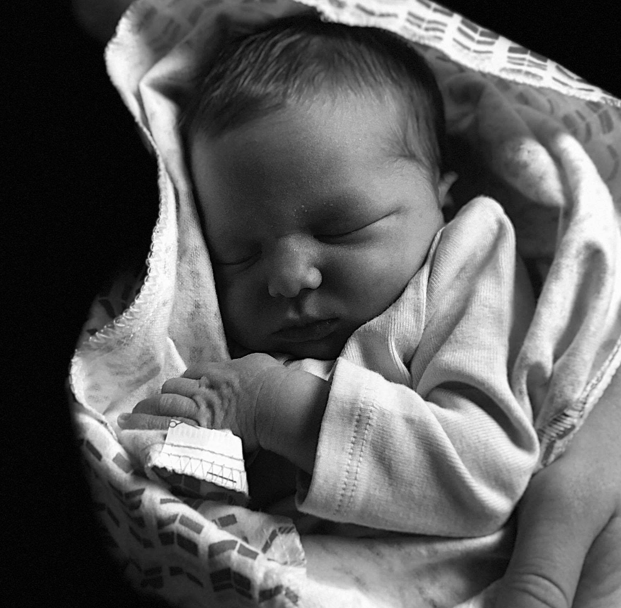 A'Layla Ann is registered to the contest to win money with this photo: baby, baby_sleeping, bedtime, birth, black_and_white, cheek, child, comfort, hand, monochrome, monochrome_photography, nap, nose, person, photography, sleep, smile, toddler