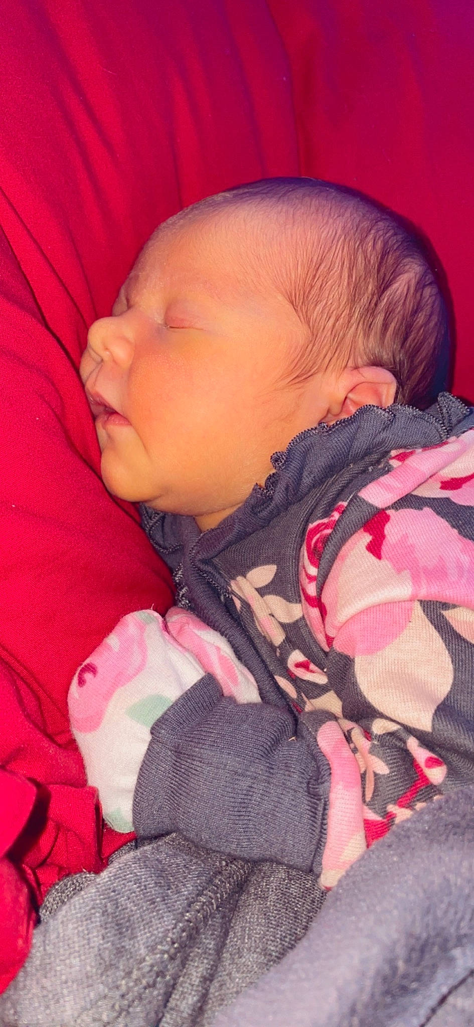 Kinzley is registered to the contest to win money with this photo: baby, baby_products, baby_sleeping, baby_toddler_clothing, cheek, child, comfort, eyelash, happy, linens, lip, magenta, mouth, nose, orange, pattern, person, pink, skin, textile