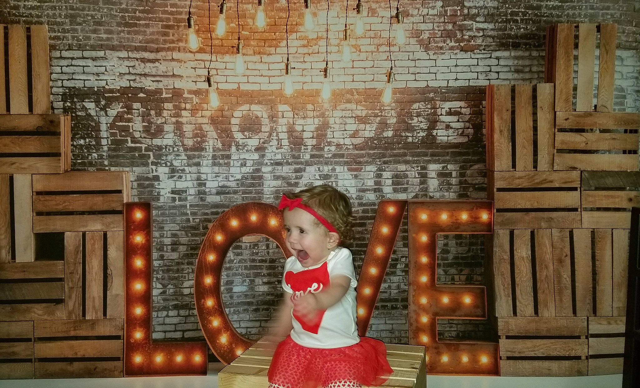 Emma Rose is registered to the contest to win money with this photo: brick, brickwork, fawn, furniture, joy, person, room, wall, wood