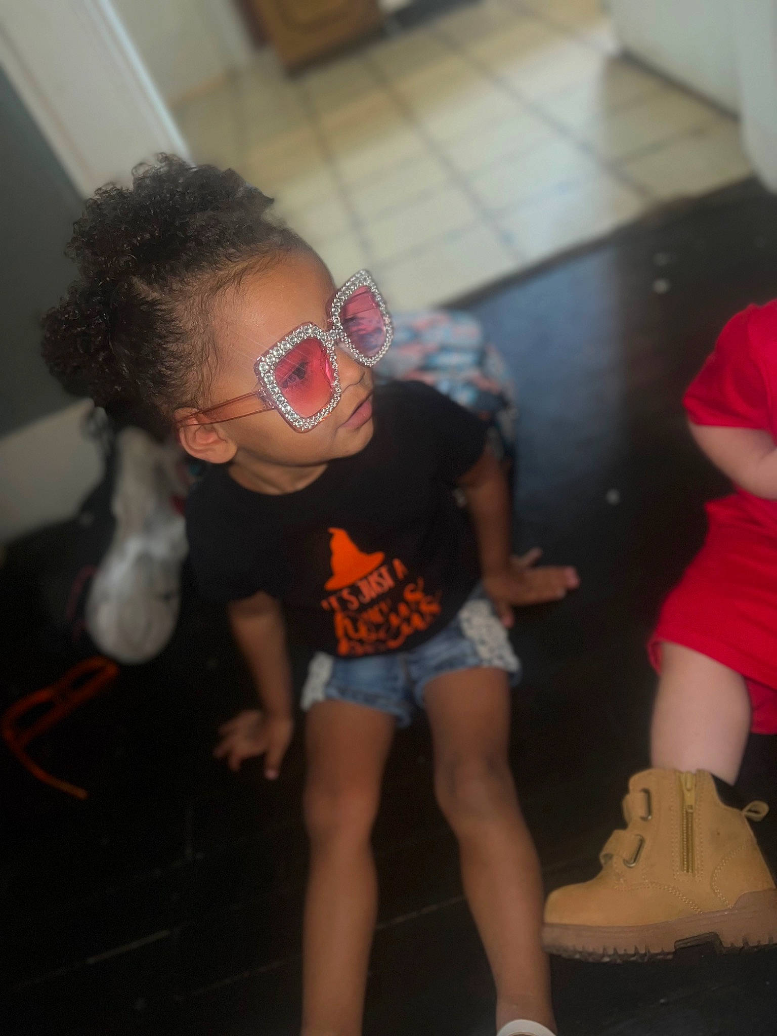 Armoni is registered to the contest to win money with this photo: cool, entertainment, event, eyewear, fashion_design, flash_photography, flooring, fun, hairstyle, human, human_leg, joint, knee, mouth, performing_arts, person, shorts, shoulder, t_shirt, thigh