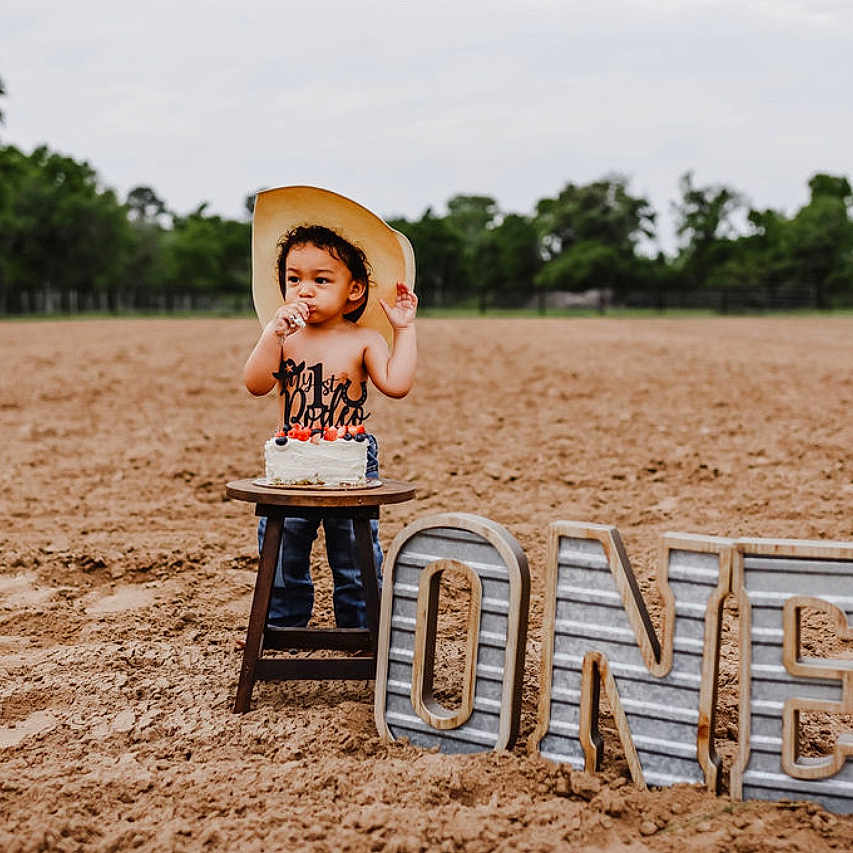 Casscious joined the competition — help win amazing prizes! birthdaycake, boy, cake, child, clothing, cream, dessert, face, food, grass, hat, head, male, people, person, photography, plant, portrait, sitting, summer