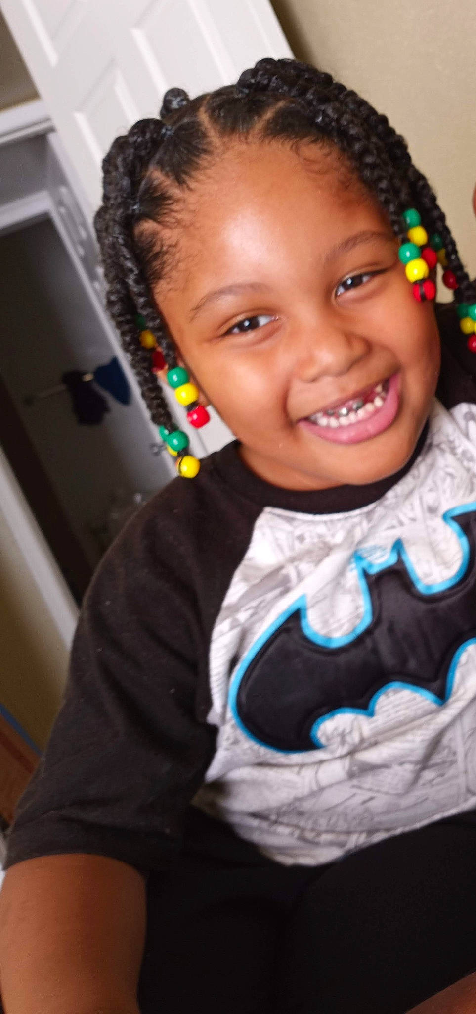 King is registered to the contest to win money with this photo: black_hair, child, electric_blue, event, eye, eyebrow, eyelash, fashion_accessory, forehead, fun, hair, happy, head, jewellery, jheri_curl, joy, lip, nose, person, room