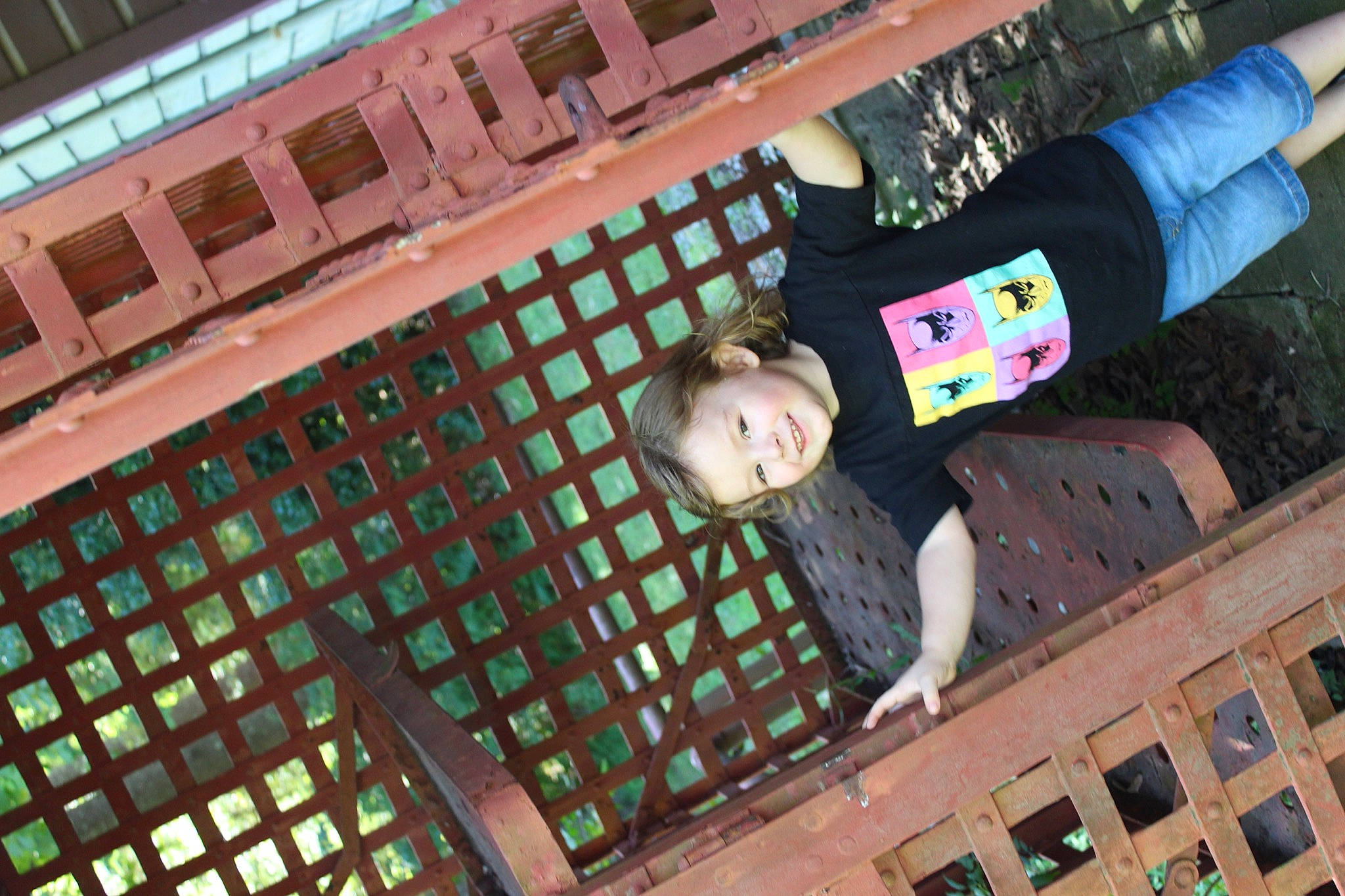 Bryan is registered to the contest to win money with this photo: building, child, city, design, facade, fun, green, happy, joy, leisure, light, magenta, pattern, person, photograph, photography, red, smile, snapshot, street_fashion