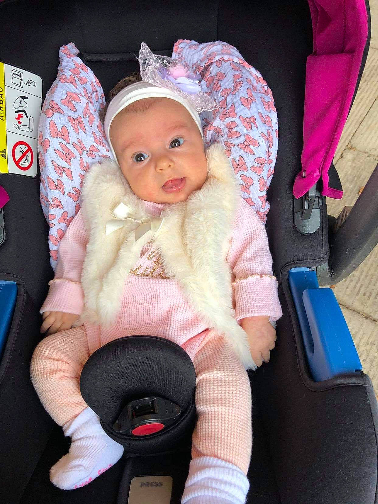 Carina joined the competition — help win amazing prizes! auto_part, baby, baby_carriage, baby_in_car_seat, baby_products, car_seat, car_seat_cover, child, headwear, person, pink, product, toddler