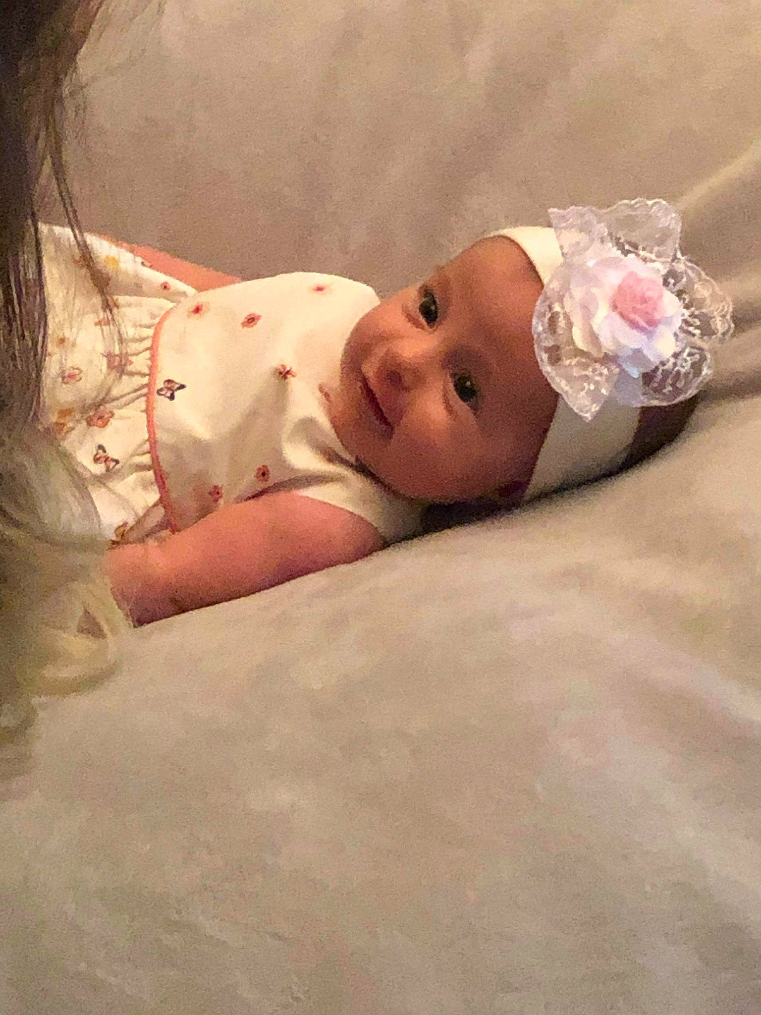 Carina is registered to the contest to win money with this photo: baby, child, hair_accessory, headwear, person, skin, toddler