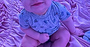 Jasper is registered to the contest to win money with this photo: baby, blanket, child, clothing, cute, fabric, face, feet, happy, indoors, infant, legs, person, pink, portrait, sitting, smiling, soft, toddler, young
