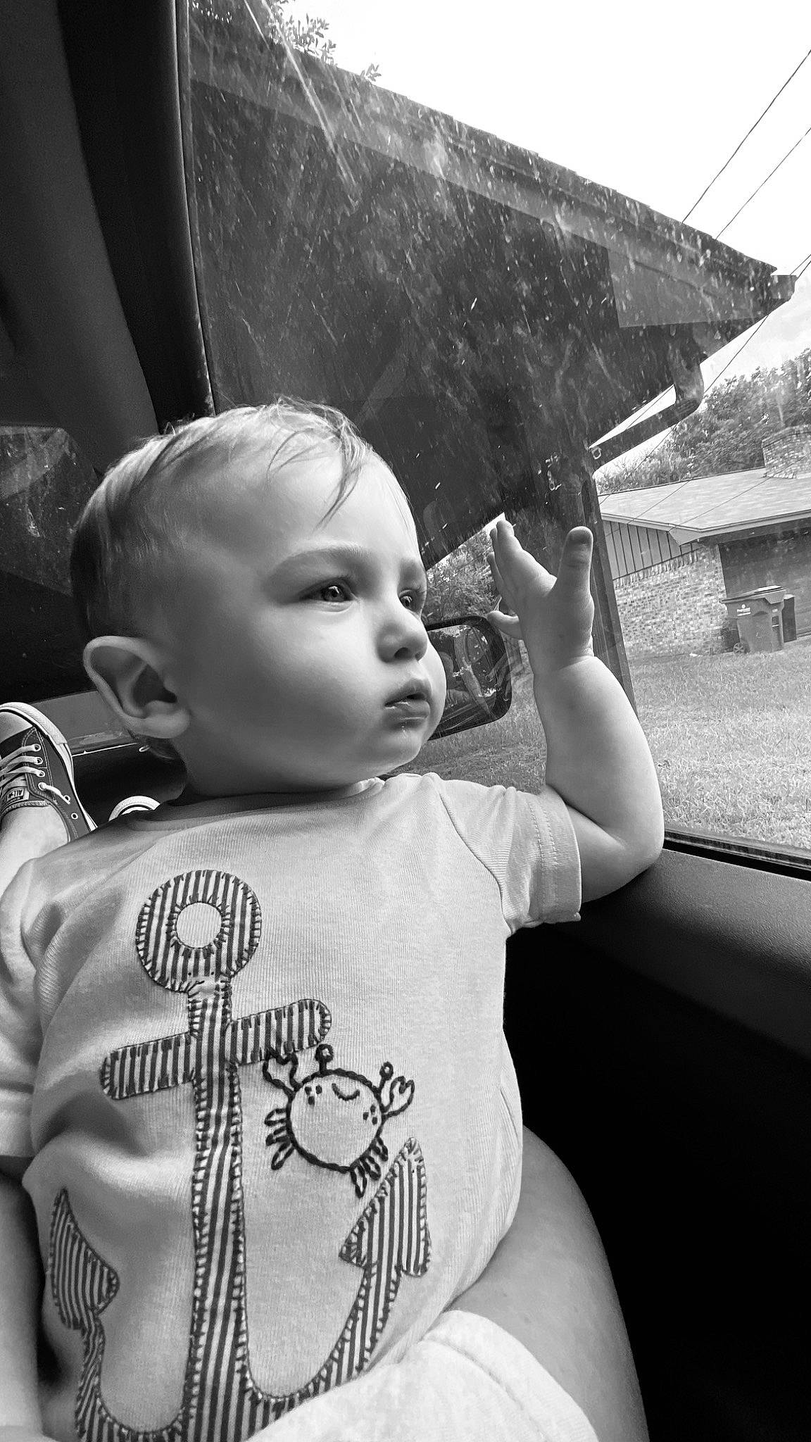 Kaesen is registered to the contest to win money with this photo: baby, black, black_and_white, cheek, child, cool, eye, lip, monochrome, monochrome_photography, nose, person, photography, skin, smile, snapshot, style, toddler, vacation, white