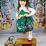 Araya is registered to the contest to win money with this photo: child, girl, smile, dress, green_dress, bow, socks, red_shoes, sled, winter, snowman, lantern, holiday, festive, background, portrait, happy, curly_hair, indoor, celebration