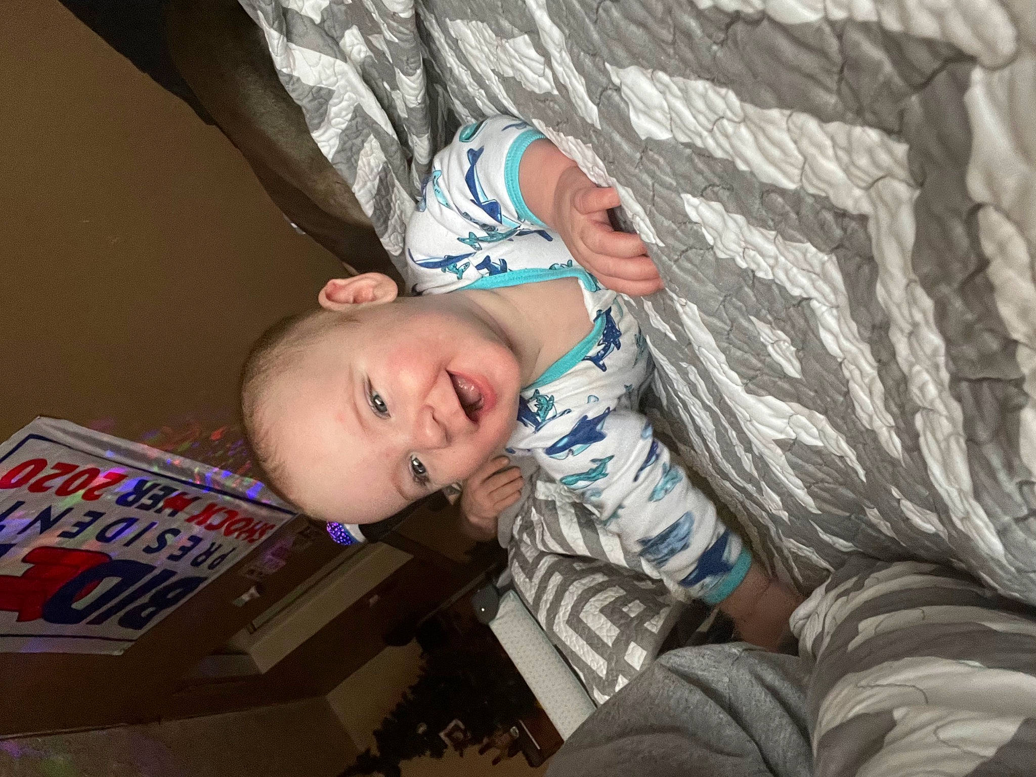 Creed is registered to the contest to win money with this photo: baby_toddler_clothing, box, cardboard, carton, child, comfort, electric_blue, eye, flash_photography, fun, happy, joy, pattern, person, plaid, portrait_photography, shipping_box, sitting, sleeve, smile