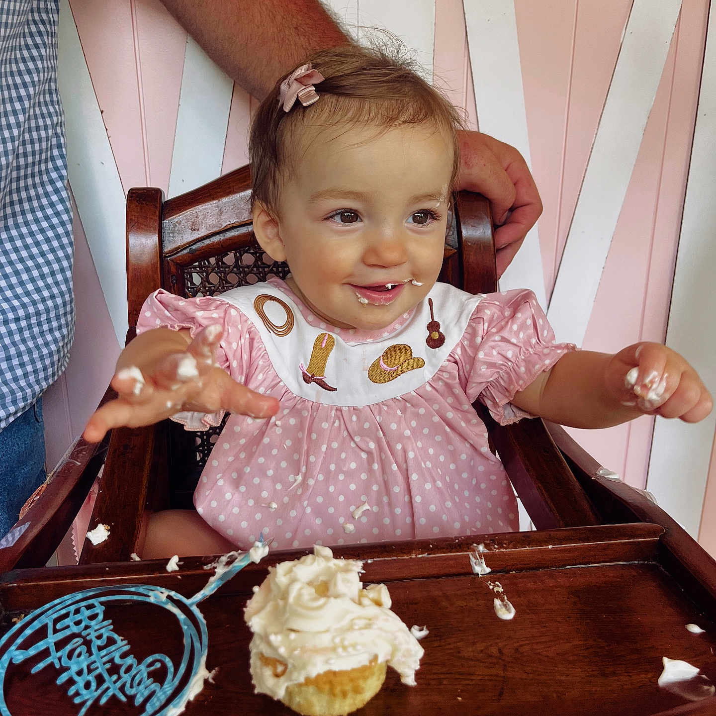 Sadie joined the competition — help win amazing prizes! arm, birthday, celebration, chair, child, cream, cupcake, face, food, frosting, hands, happy, highchair, indoor, messy, pink_dress, polka_dot, smiling, toddler, wood