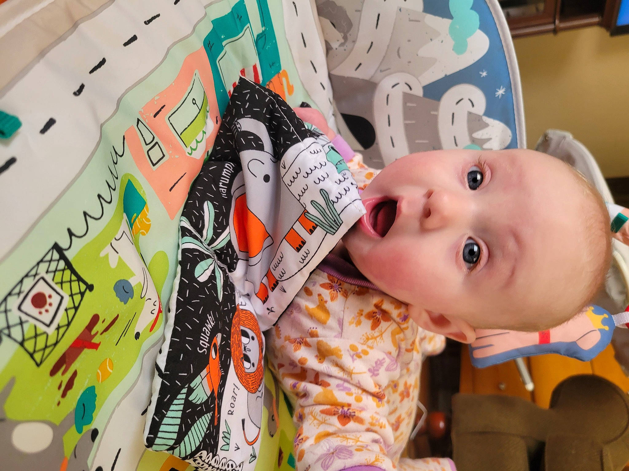 Adrianna is registered to the contest to win money with this photo: art, baby, baby_products, baby_toddler_clothing, baby_toys, cheek, child, font, fun, happy, linens, pattern, person, play, room, sleeve, surprise, t_shirt, textile, toddler