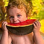 toddler, child, watermelon, fruit, summer, outdoor, curly_hair, blue_eyes, bare_chest, juice, eating, happy, cute, portrait, food, close_up, natural_light, greenery, warm_tones, fun