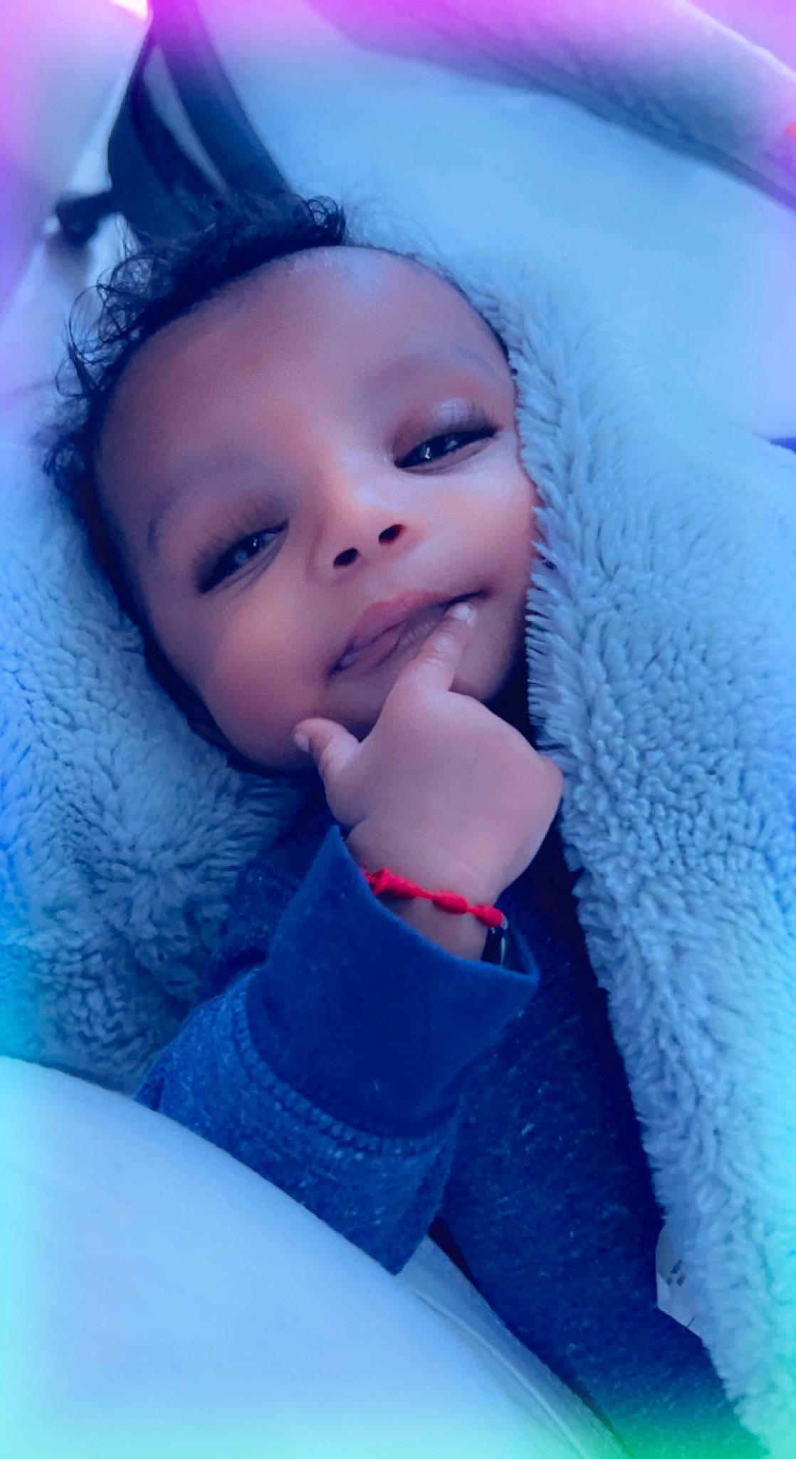 Maison is registered to the contest to win money with this photo: azure, baby, baby_toddler_clothing, cheek, child, chin, electric_blue, eyelash, flash_photography, fun, happy, human_body, iris, lip, mouth, neck, nose, person, skin, snow