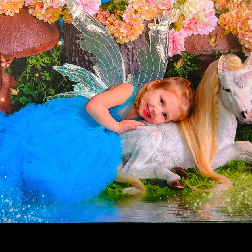 Oakleigh is registered to the contest to win money with this photo: child, clothing, cream, dessert, dress, face, female, flower, flowerarrangement, flowerbouquet, food, girl, head, icing, person, petal, photography, plant, portrait, pottedplant