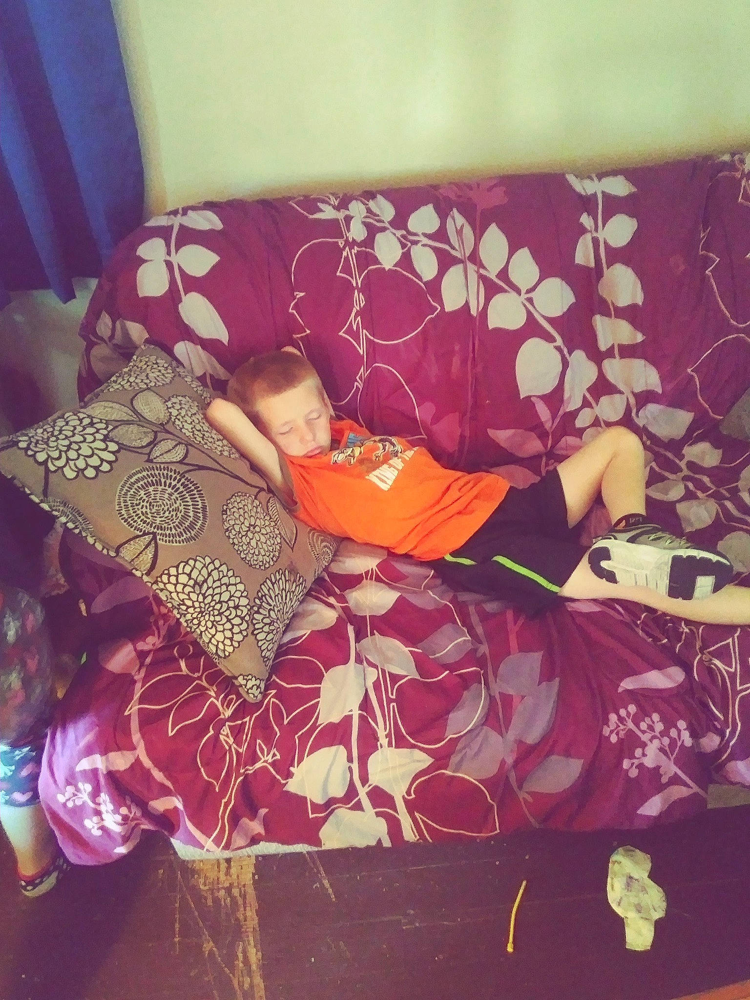 Gerald Simpson is registered to the contest to win money with this photo: bed_sheet, couch, cushion, furniture, interior_design, linens, magenta, pattern, person, pink, purple, room, textile, violet