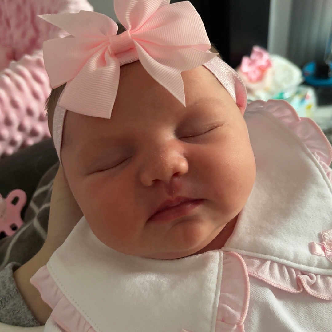 Darcie-Rae joined the competition — help win amazing prizes! accessories, baby, bonnet, clothing, cushion, face, hat, head, headband, homedecor, newborn, person, photography, portrait, sleeping, towel