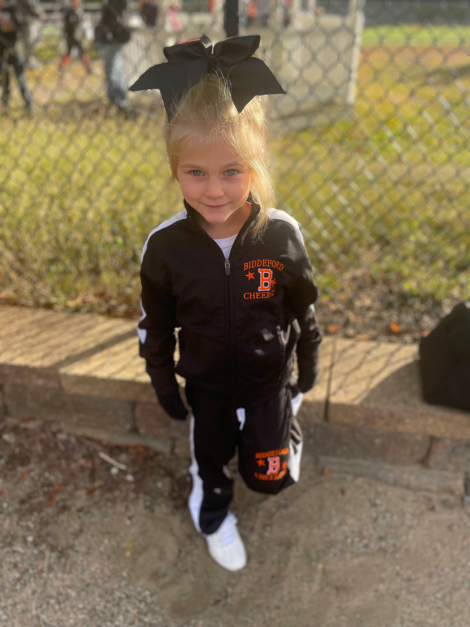 Isabel joined the competition — help win amazing prizes! academic_dress, chain_link_fencing, child, event, fence, fun, grass, happy, hat, joy, mesh, mortarboard, person, personal_protective_equipment, recreation, scholar, sleeve, smile, soil, toddler