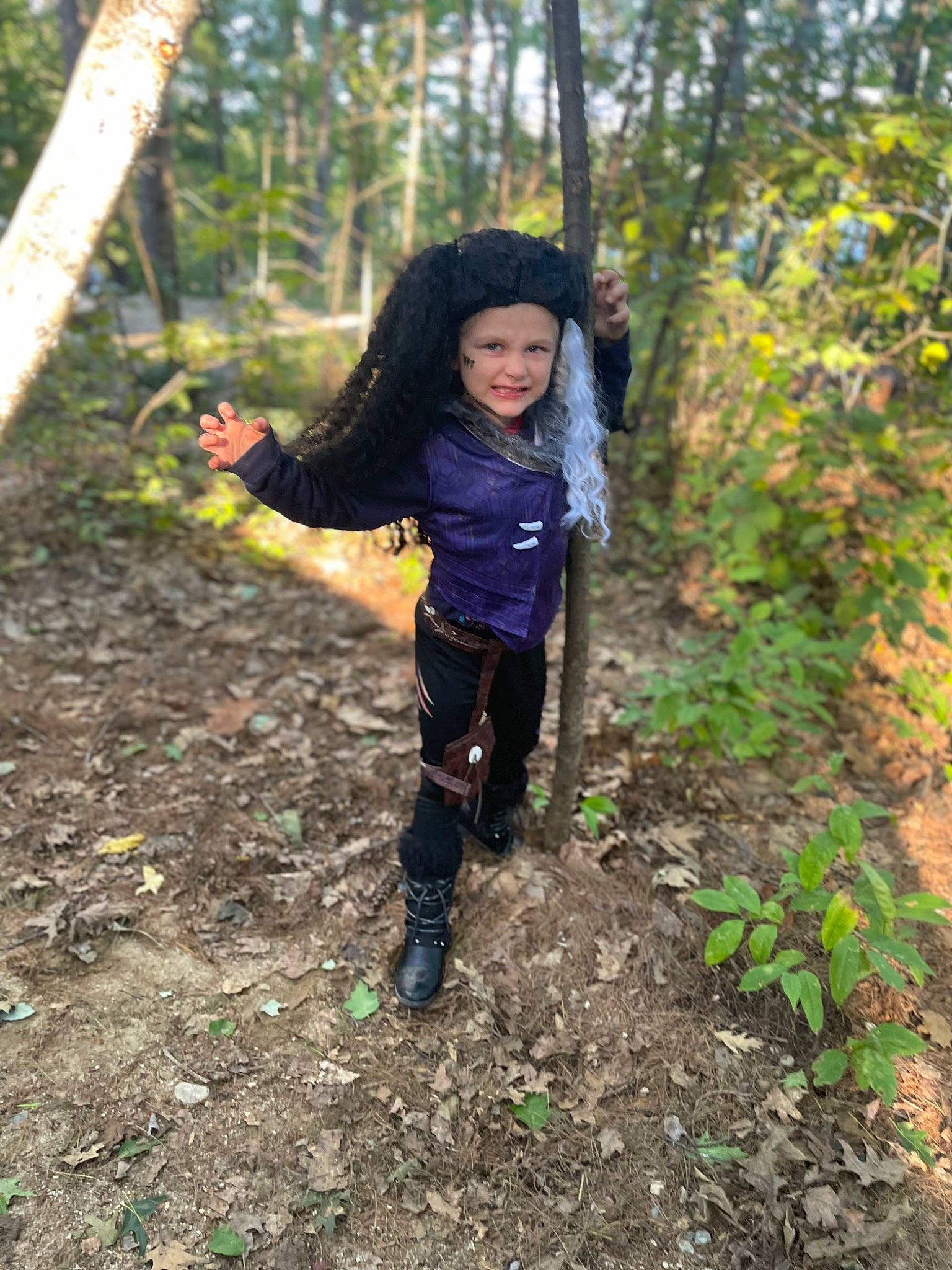 Isabel is registered to the contest to win money with this photo: botany, deciduous, eye, face, forest, grass, happy, headwear, joy, leisure, natural_landscape, outdoor_recreation, people_in_nature, person, plant, recreation, smile, terrestrial_plant, toddler, tree