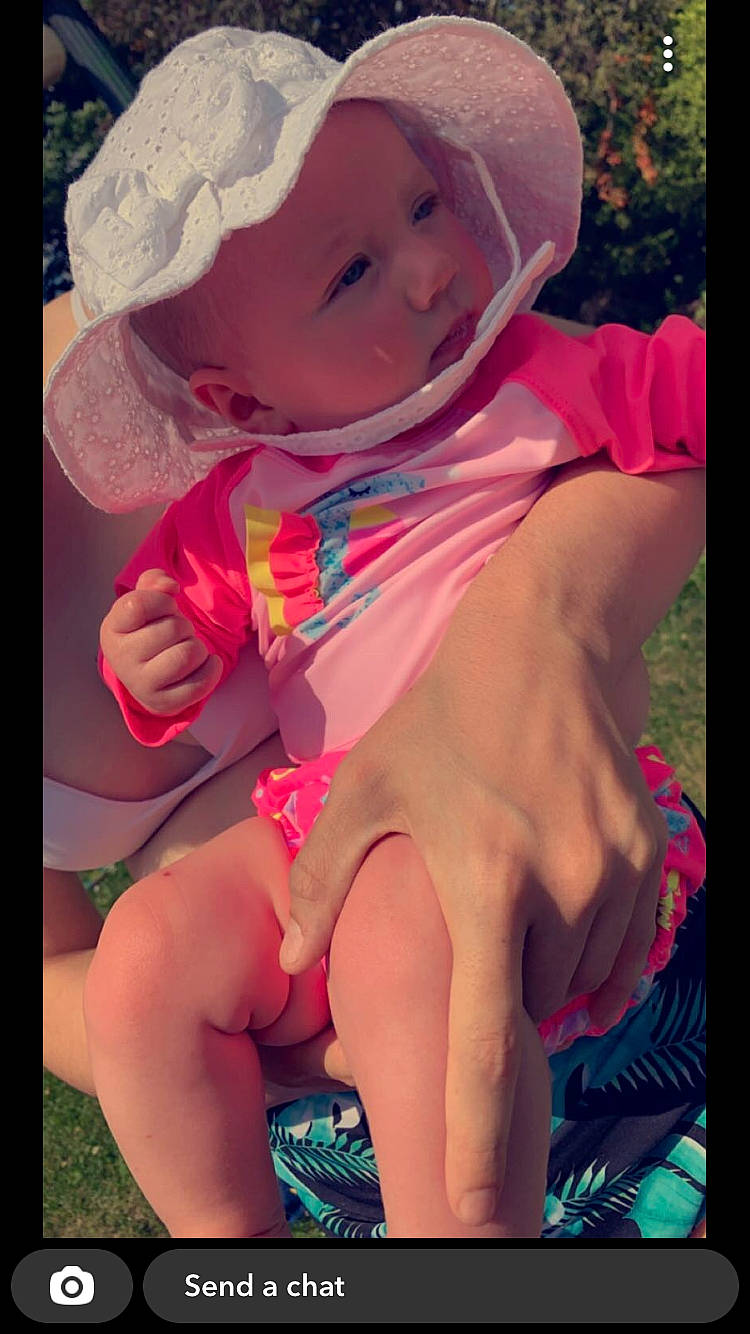 Lyla joined the competition — help win amazing prizes! baby_toddler_clothing, beauty, child, costume_hat, dress, fashion_accessory, fun, grass, happy, hat, headwear, human_leg, magenta, pattern, peach, people_in_nature, person, pink, skin, sun_hat