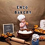 Enzo is registered to the contest to win money with this photo: baby, chef_hat, baking, flour, eggs, bread, muffins, rolling_pin, wooden_spoon, basket, pastry, table, sign, food, child, portrait, indoor, cute, cooking, brown_background