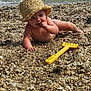 baby, child, beach, sand, hat, toy, yellow, water, waves, curious, nature, outdoor, play, summer, crawling, exploring, sunhat, barefoot, rocky, shore