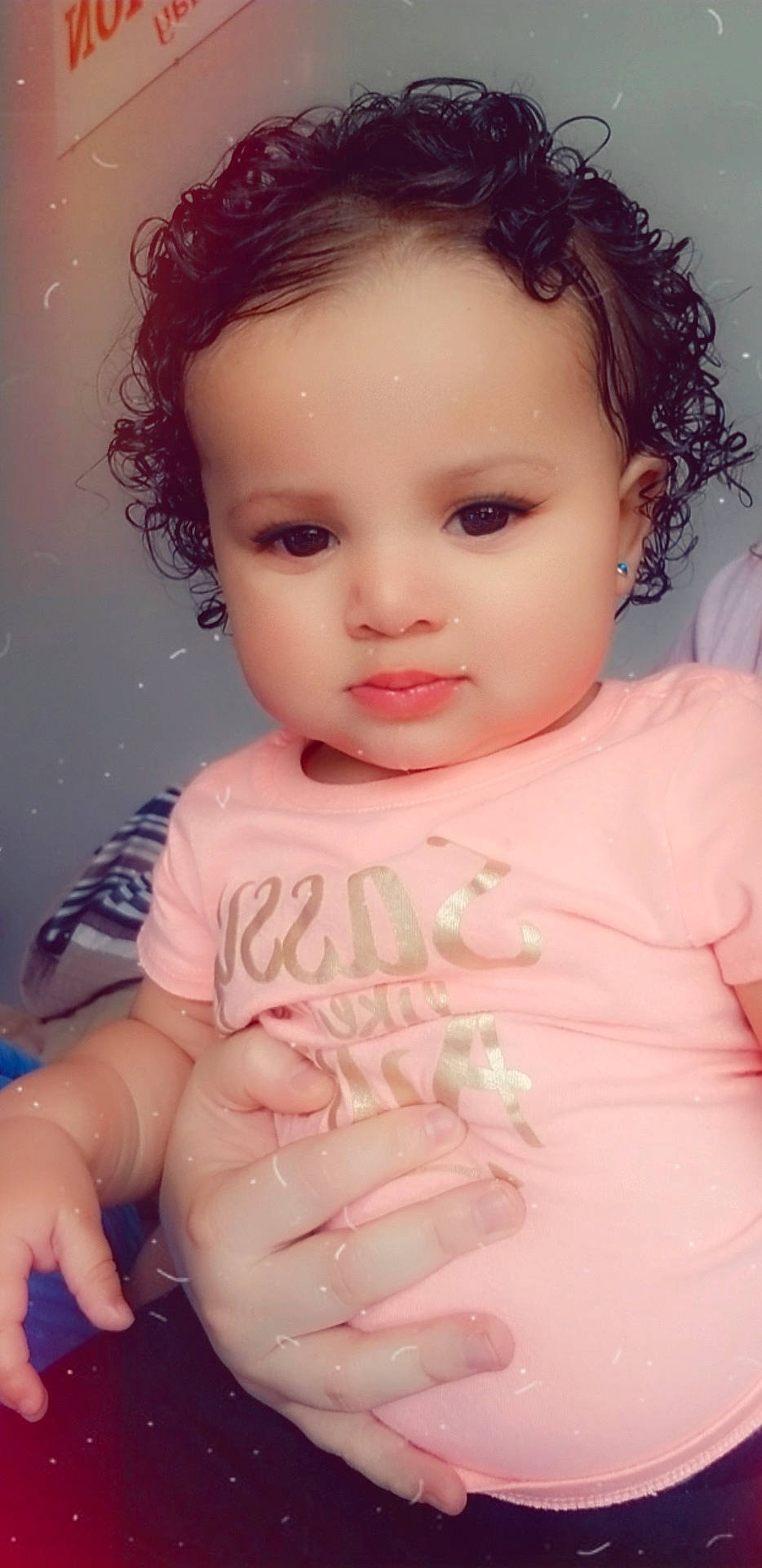 Ayanna is registered to the contest to win money with this photo: baby, beauty, brown_hair, cheek, child, child_model, chin, eye, eyebrow, face, forehead, hair, head, iris, lip, mouth, nose, person, pink, skin