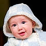 Brennus is registered to the contest to win money with this photo: baby, child, hood, smile, face, eyes, clothing, jacket, cute, portrait, infant, warm, fuzzy, young, expression, person, closeup, happy, indoors, apparel