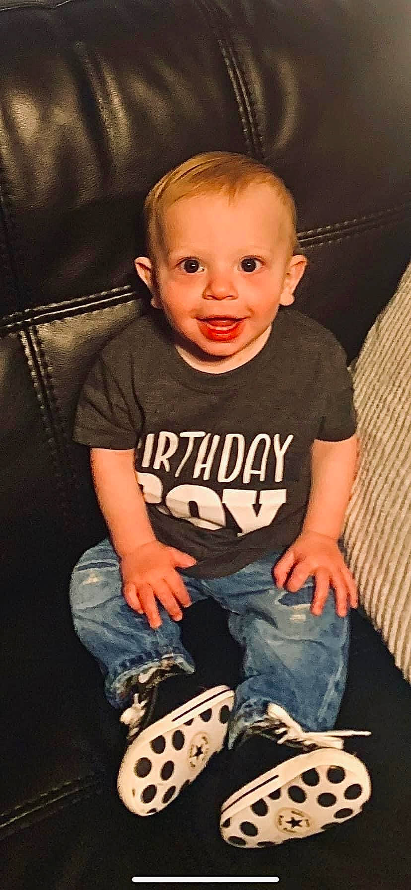 Crew is registered to the contest to win money with this photo: arm, baby_toddler_clothing, cheek, comfort, cool, eye, face, facial_expression, finger, flash_photography, flooring, happy, head, jeans, mouth, person, skin, sleeve, smile, t_shirt