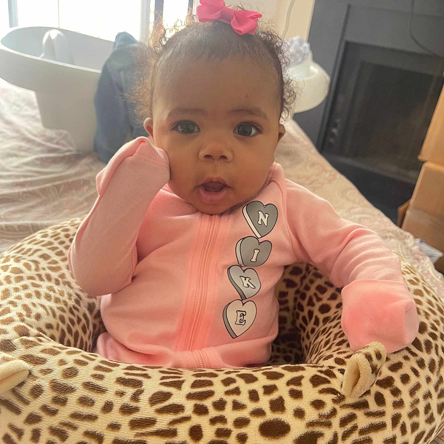 Kae Lani Nicole is registered to the contest to win money with this photo: adult, baby, bed, clothing, couch, crib, cushion, face, fireplace, furniture, head, homedecor, indoors, infantbed, male, man, person, photography, portrait, t_shirt